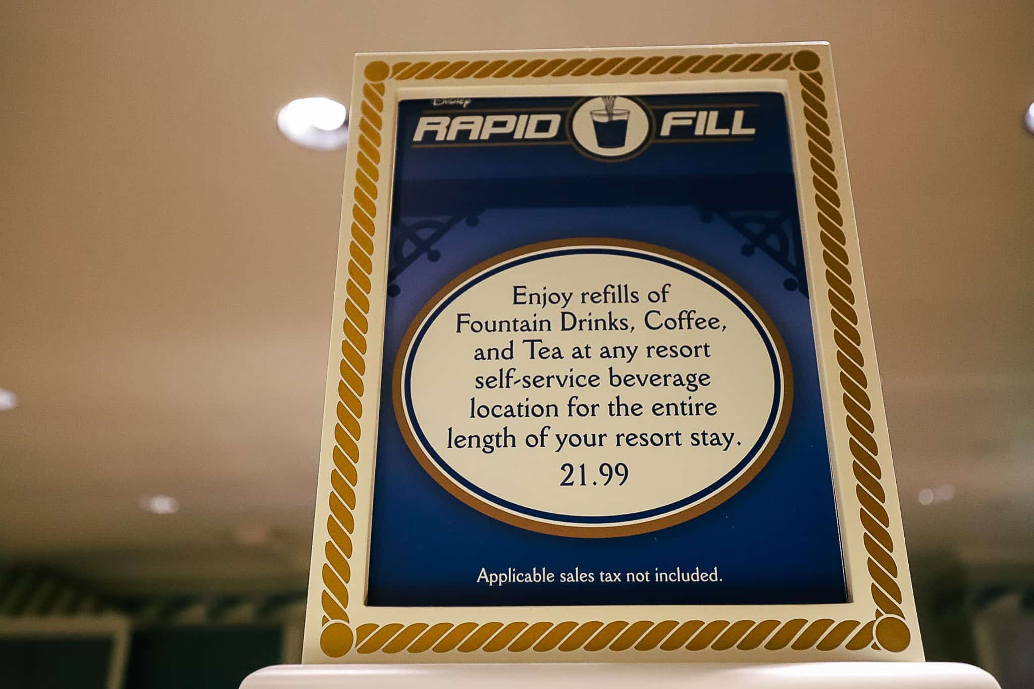 A sign that shows the price and information for purchasing a Rapid Fill mug at Disney's Beach Club Marketplace. 