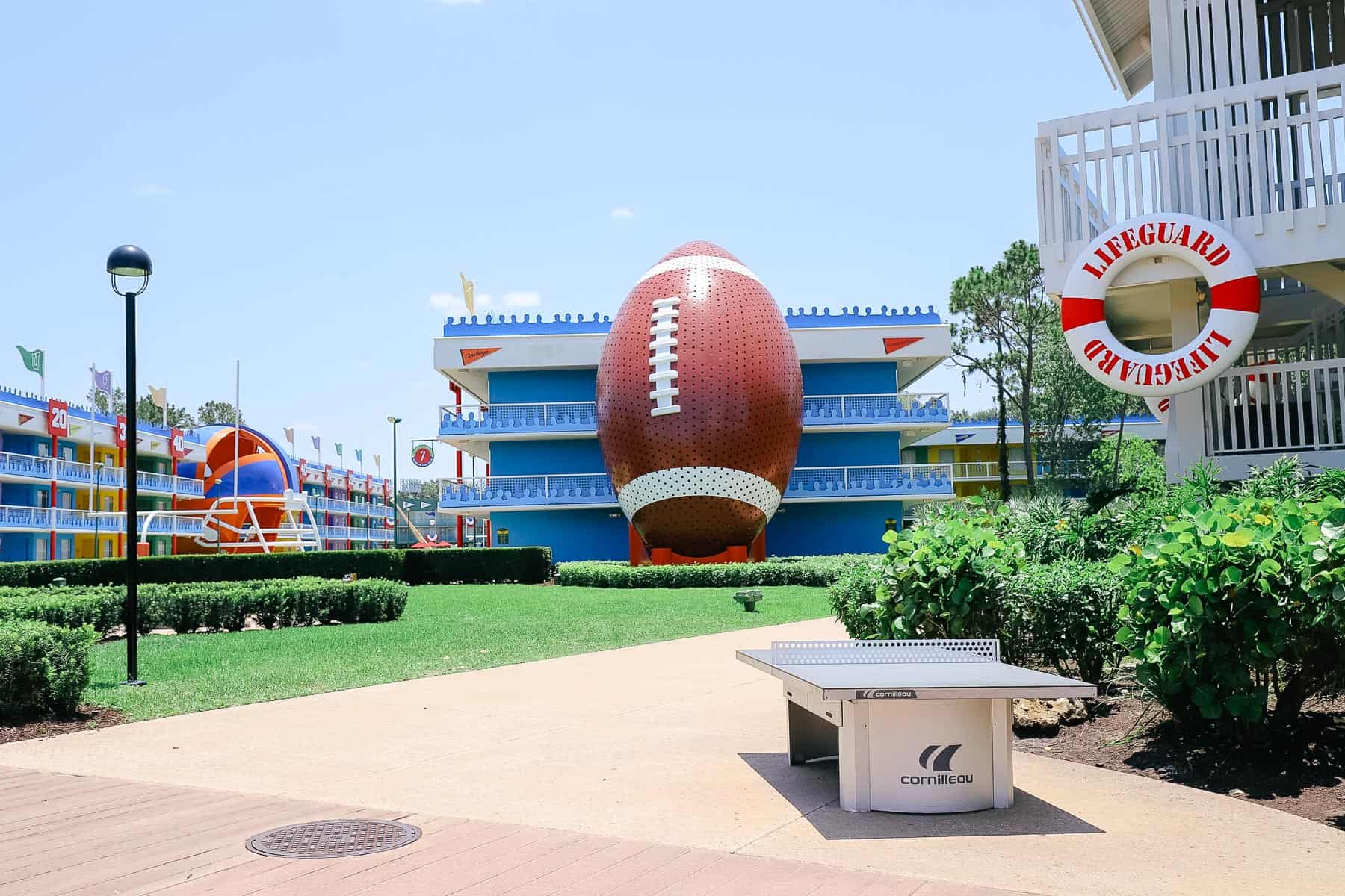 a ping pong table near the pool at All-Star Sports 