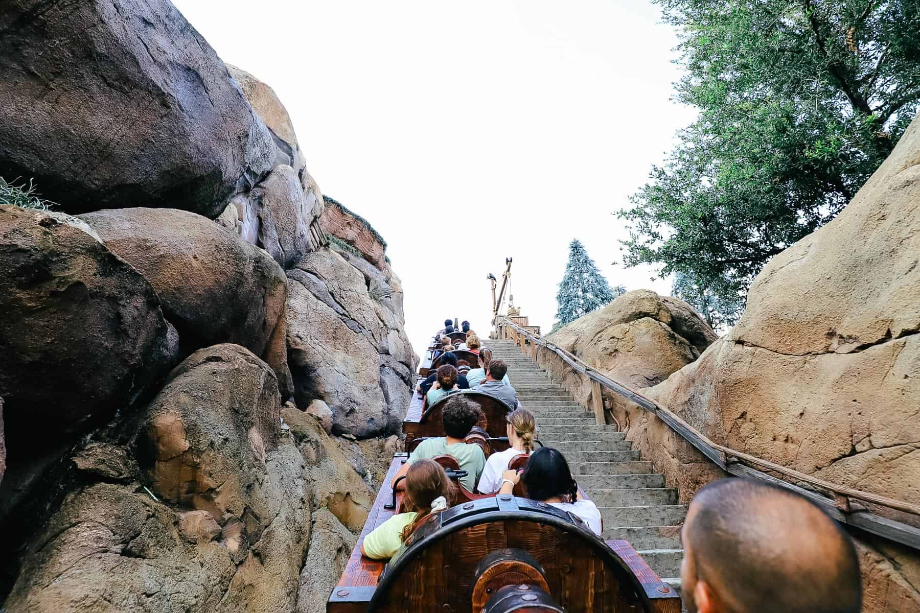 Guests waiting to go down the first hill on the mine train. 