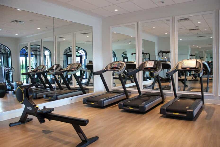 the gym at Disney's Riviera with treadmills facing mirrors 