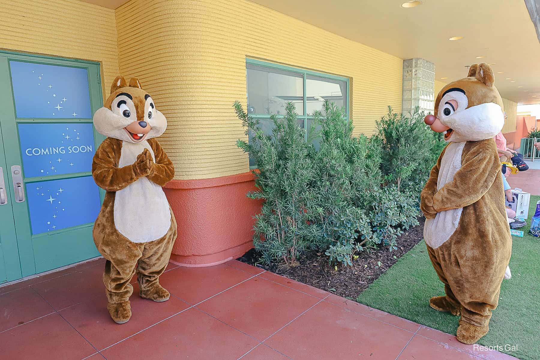 Chip an Dale playing charades with guests