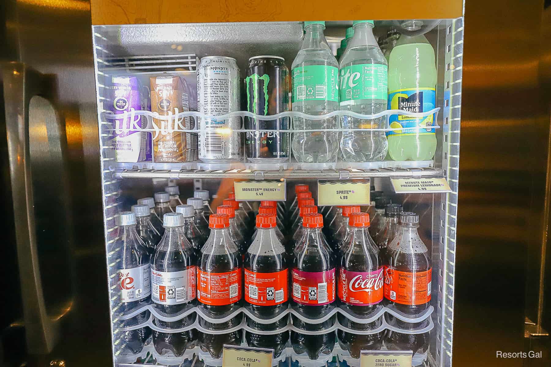 a refrigerated case with soda 