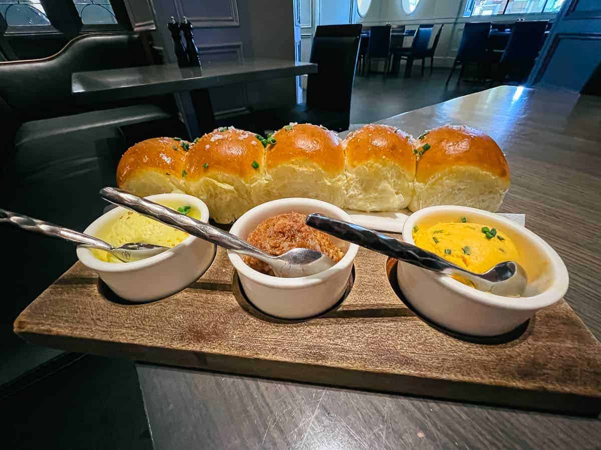 Parker House rolls with three spread from Ale and Compass 