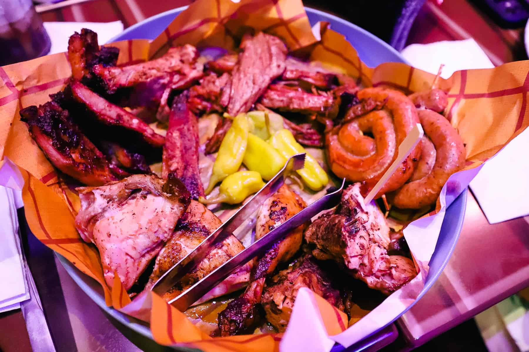 a platter of meat from a restaurant at Disney World 