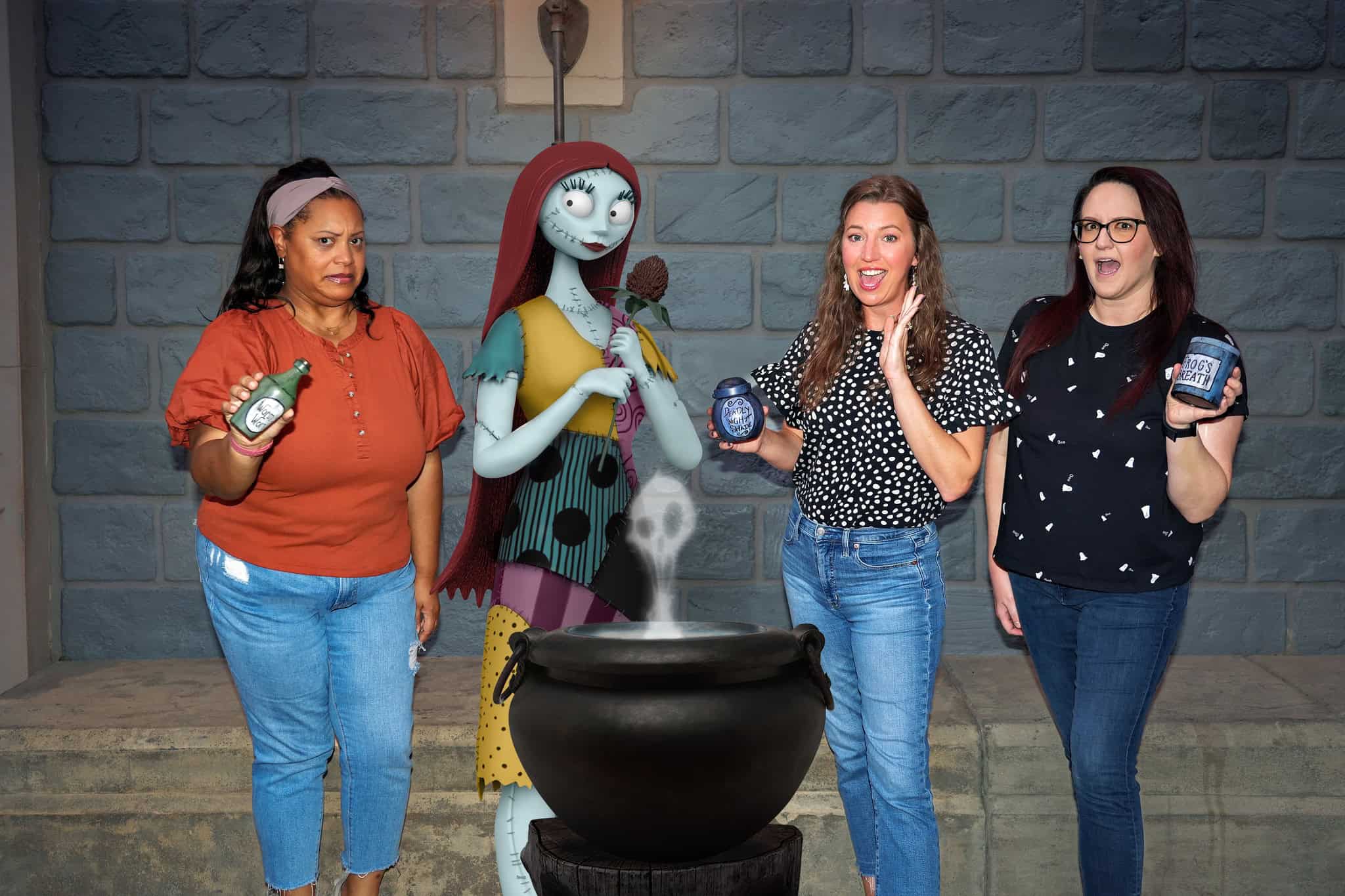 a PhotoPass opportunity where guests stand with Sally and a witches brew. Everyone is holding an animated potion ingredient 