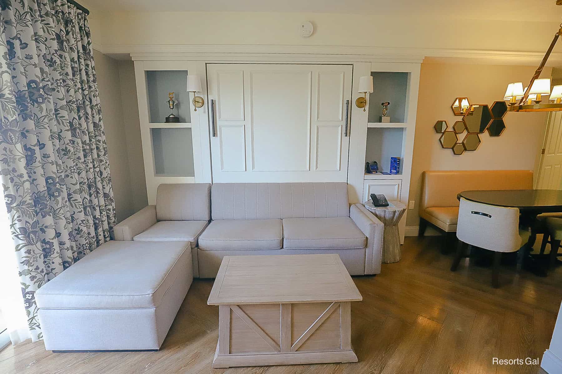 The sofa that converts to a Murphy bed in a two bedroom villa at Saratoga Springs