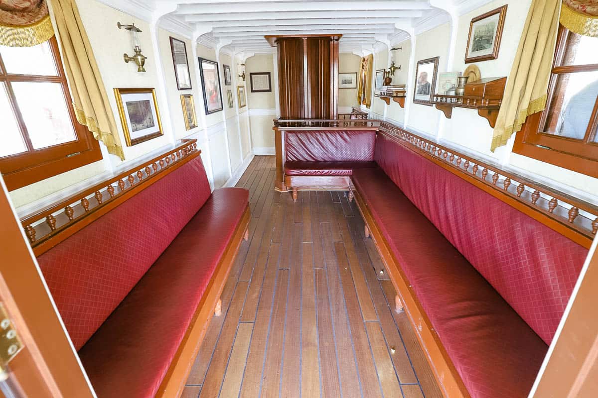 A small sitting area in the middle of the boat. 