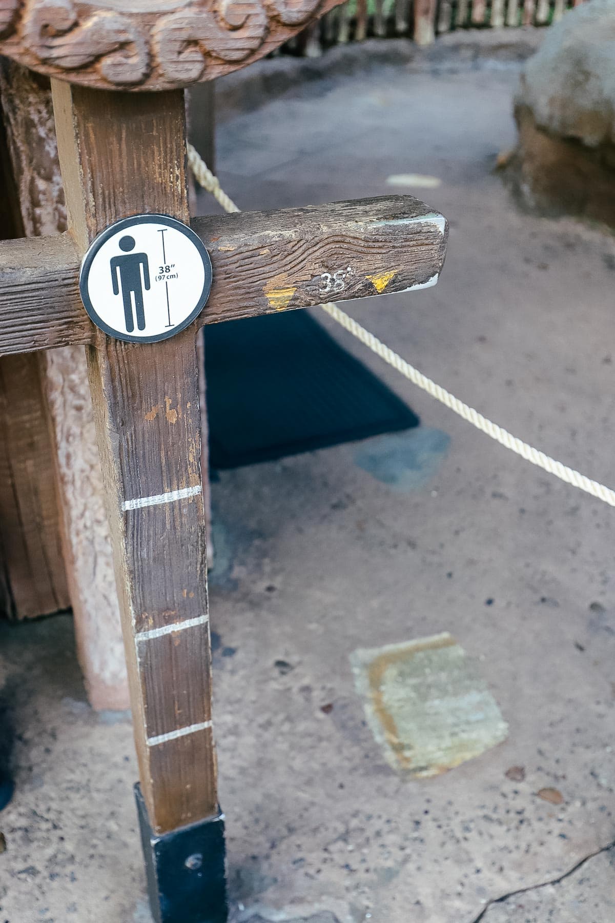 A sign that shows the 38" height requirement for Seven Dwarfs Mine Train at Magic Kingdom. 