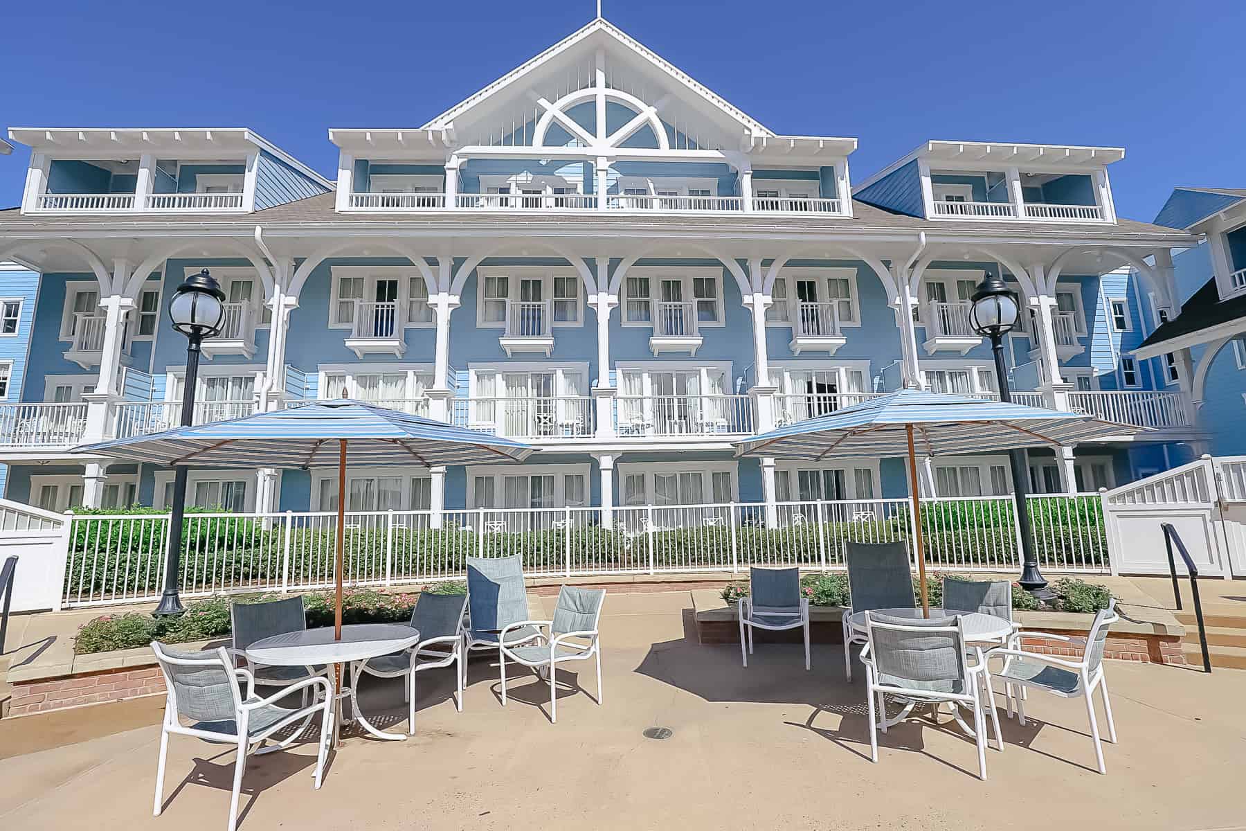 dining area with tables and umbrellas at the Beach Club's Tidal Pool