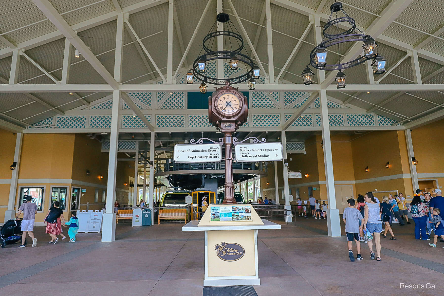 guests coming and going from the Skyliner station at Disney's Caribbean Beach