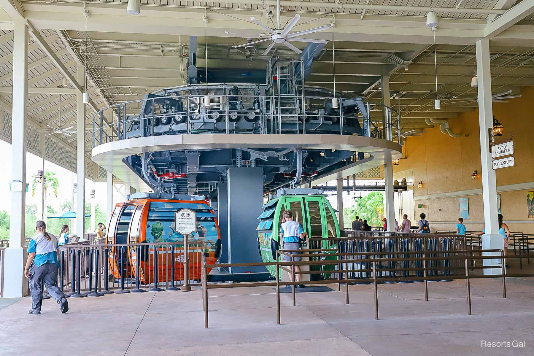 cast members loading guests at the Skyliner