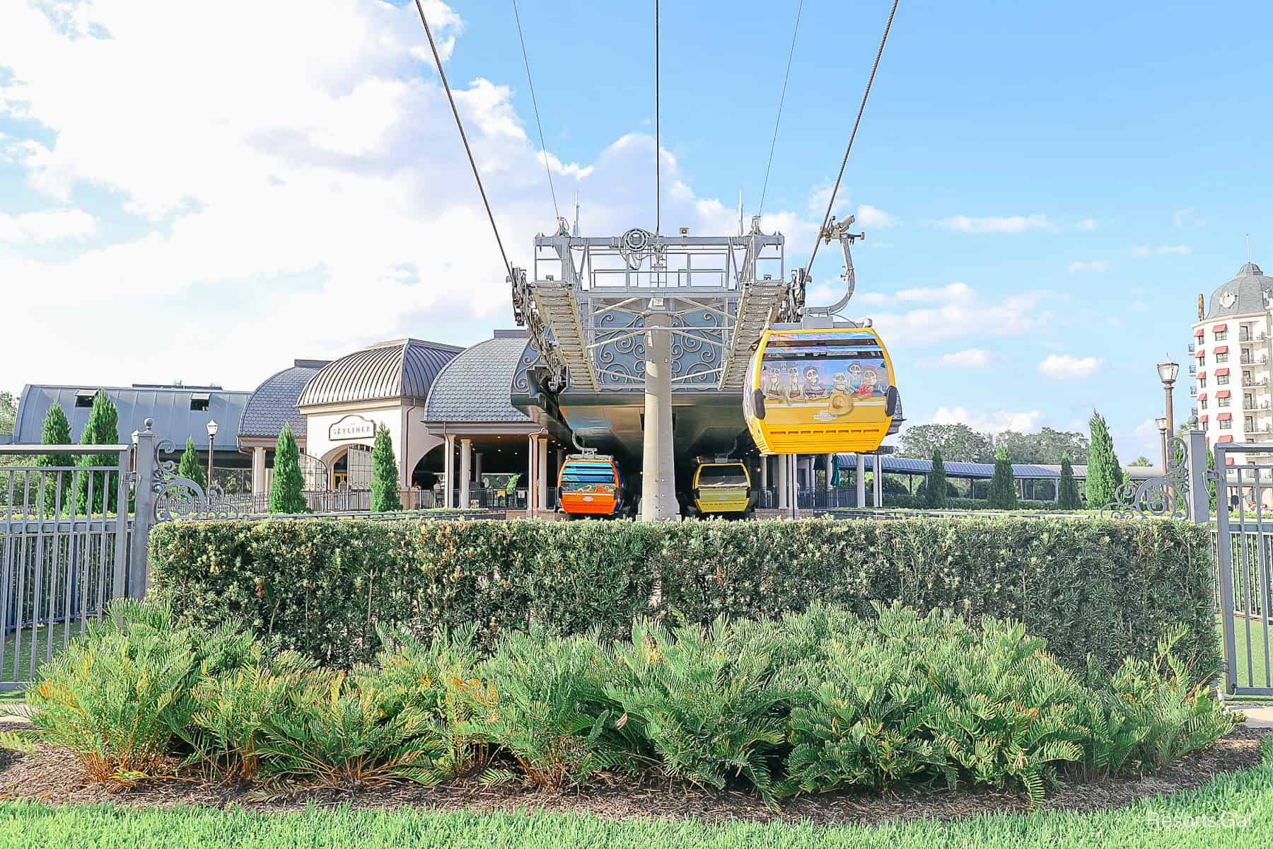 Gondolas leaving the Skyliner station at Disney's Riviera Resort
