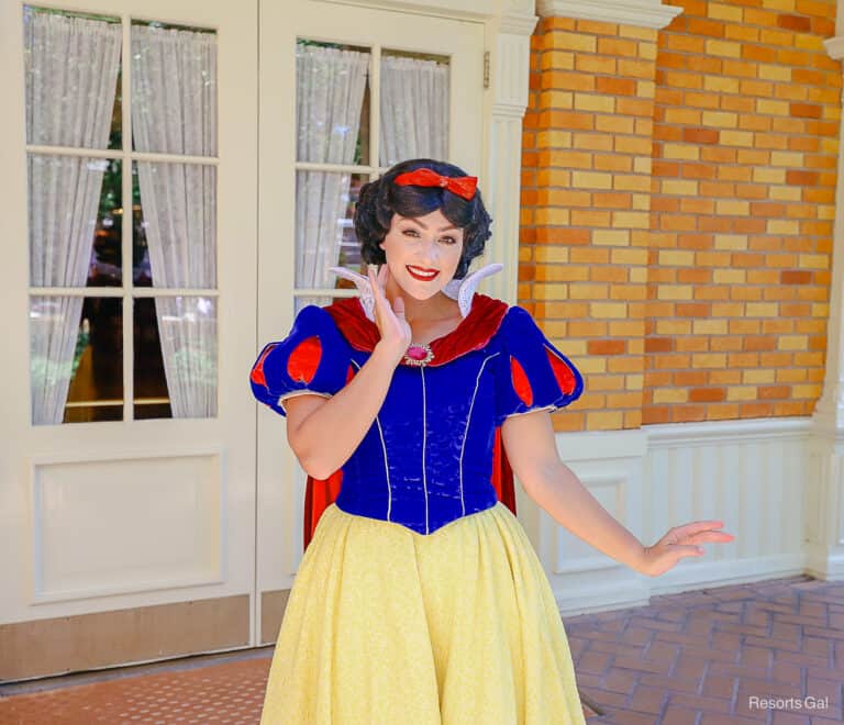 Meet Snow White on the Town Square Theater Patio (Magic Kingdom)