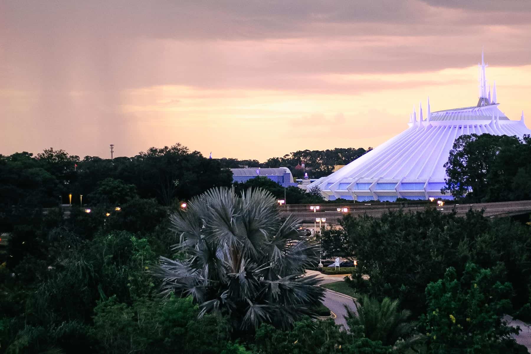 Space Mountain as a rain shower passes nearby. 