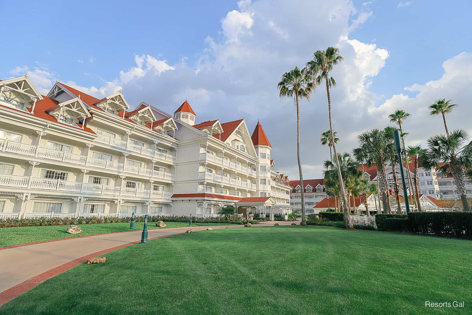 the sun shining on the Grand Floridian in the afternoon
