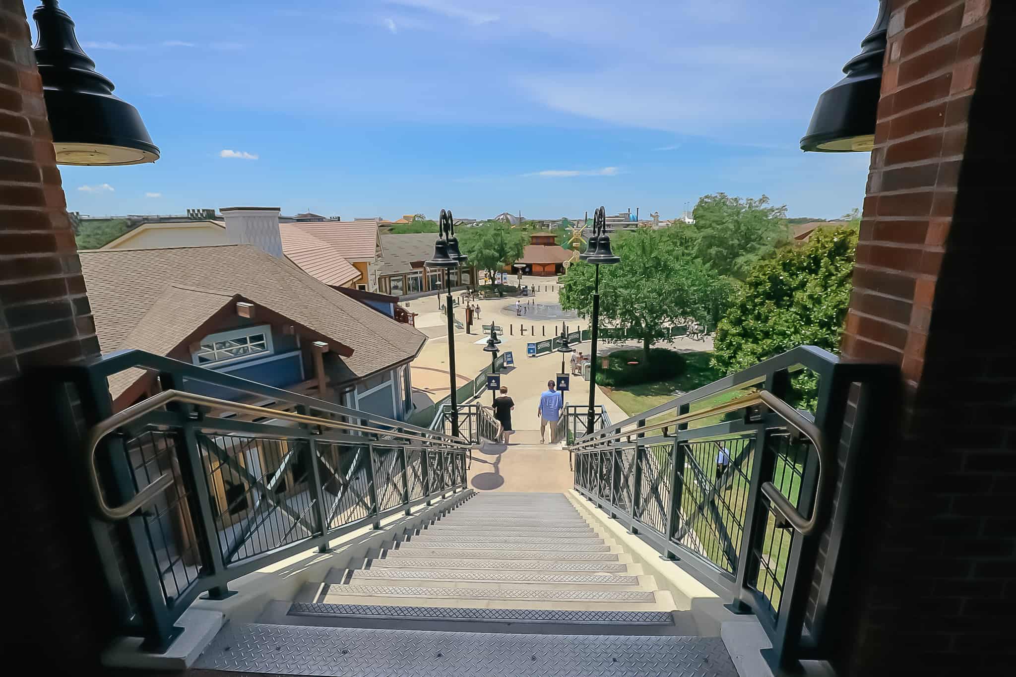 stairs leading to the Marketplace entrance of Disney Springs from the pedestrian bridge 