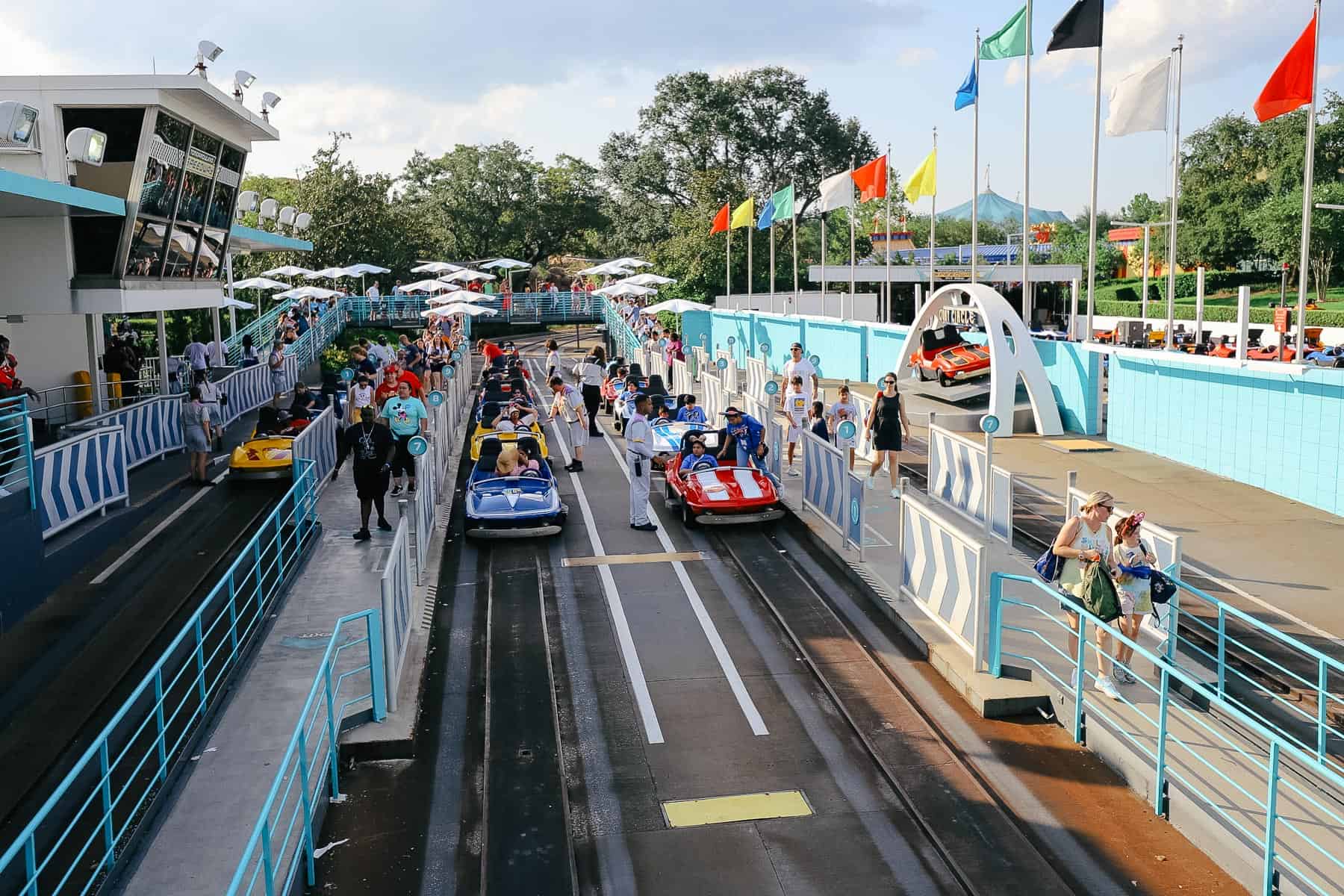 Standing on the bridge as a spectator watching guests come through on their cars. 