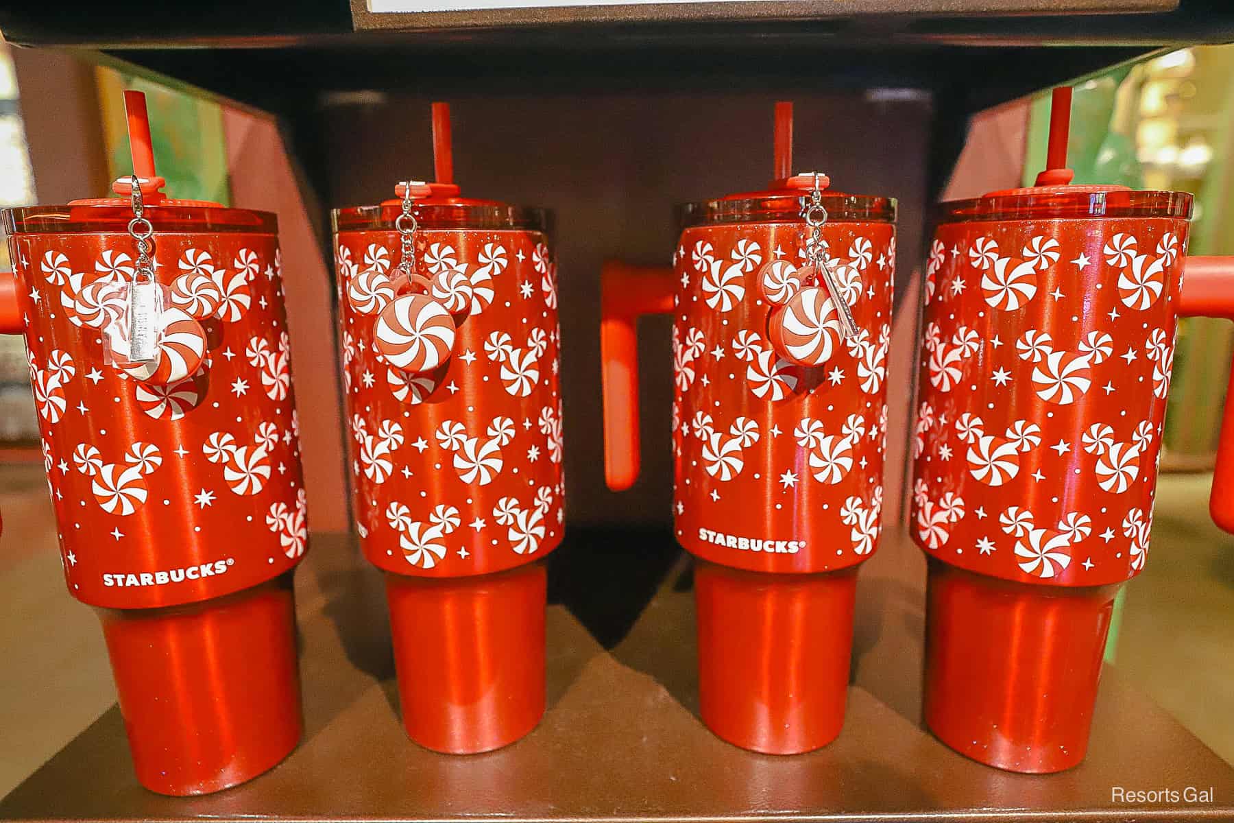 four of the red peppermint Mickey Starbucks drink holders 