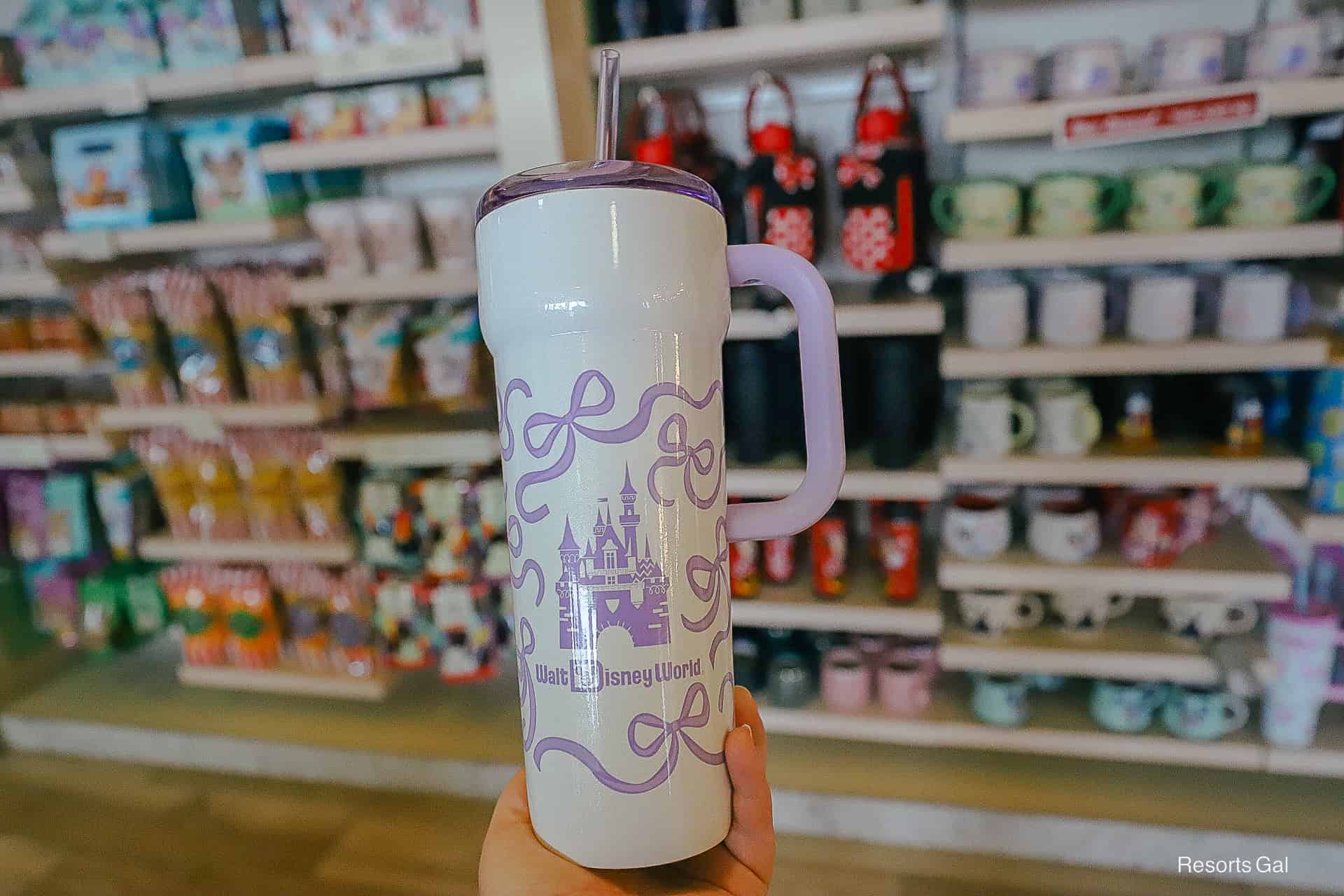 the lavender Starbucks Castle Bow Tumbler with castle and Walt Disney World logo
