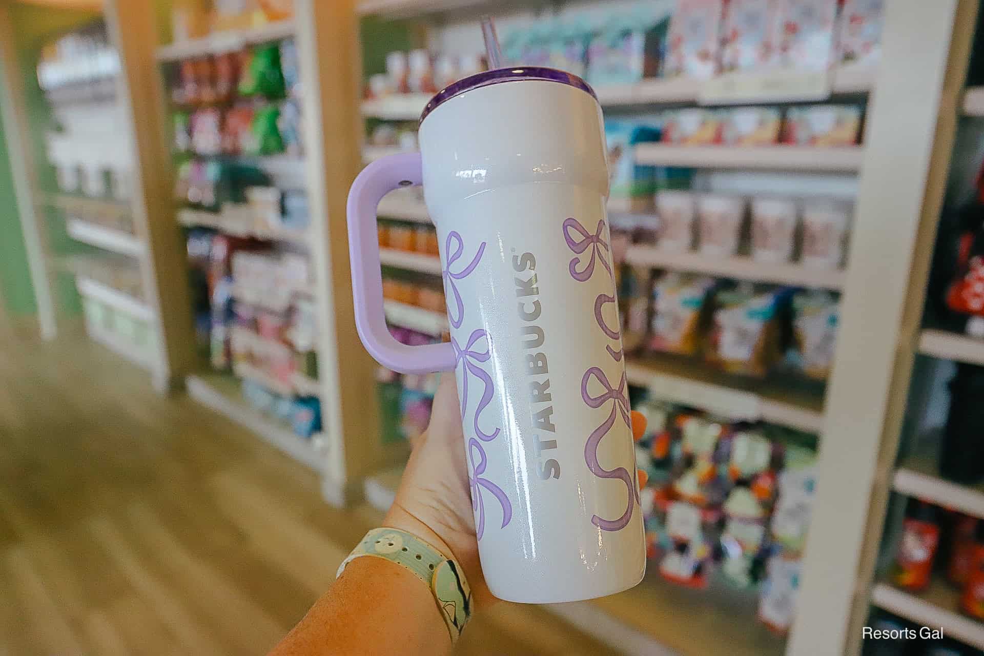 the silver Starbucks logo on the sie of the mug