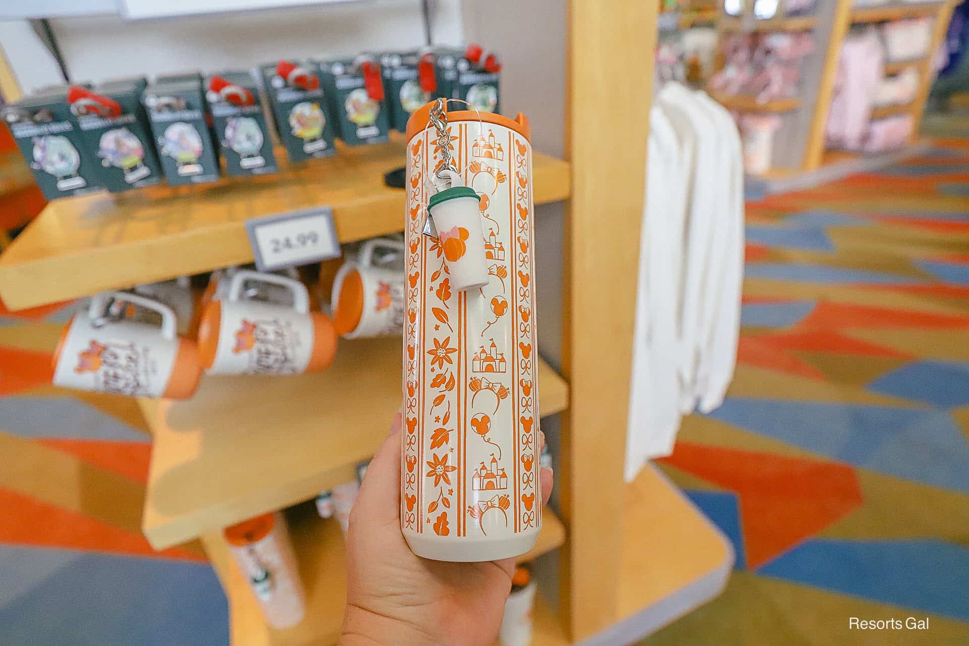 tumbler chain looks like a small coffee cup with orange Mickey icon