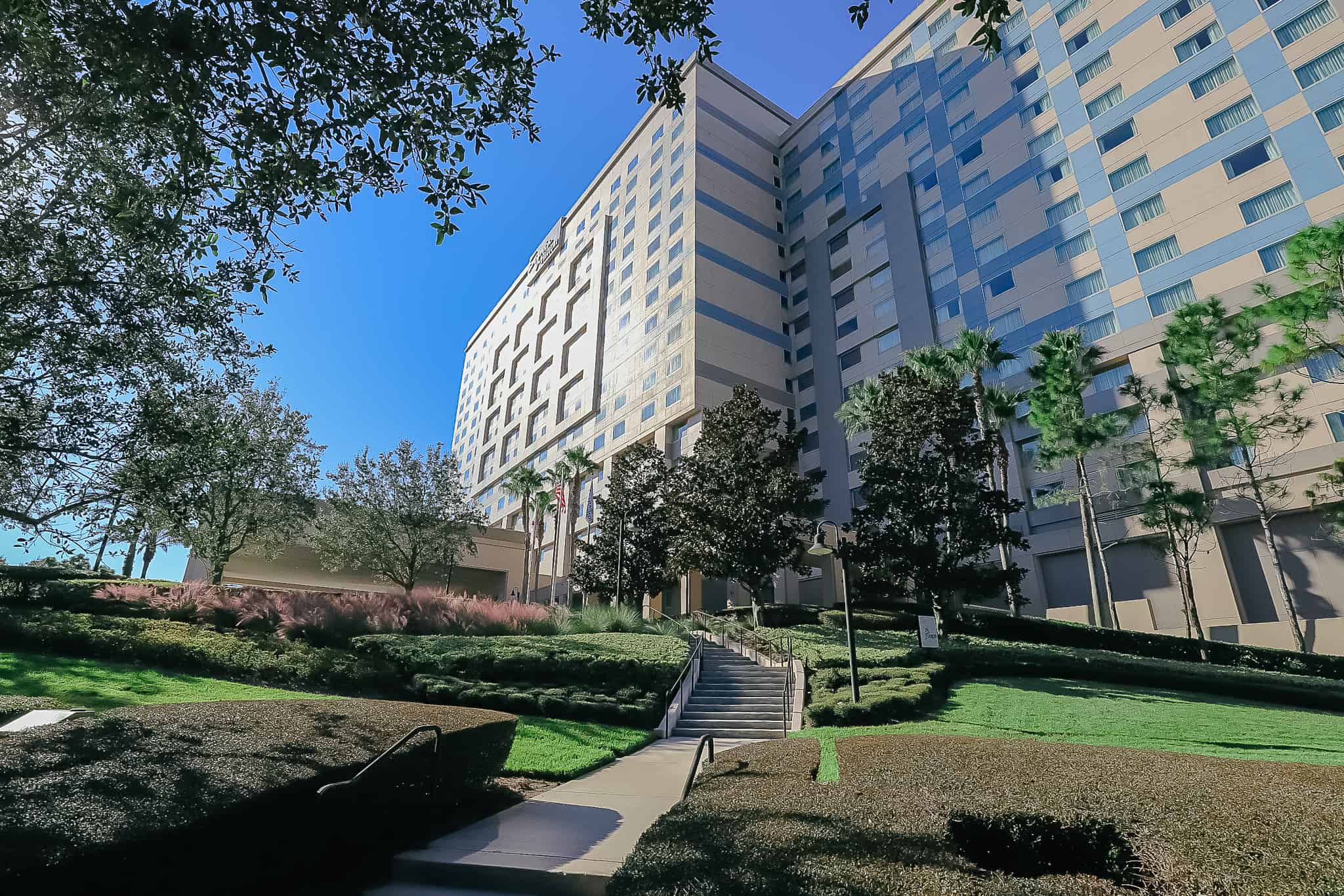 an outdoor staircase leading to the Hilton Signia Orlando 