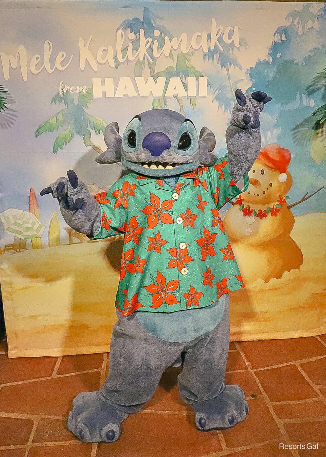 Stitch in a Christmas shirt at Magic Kingdom
