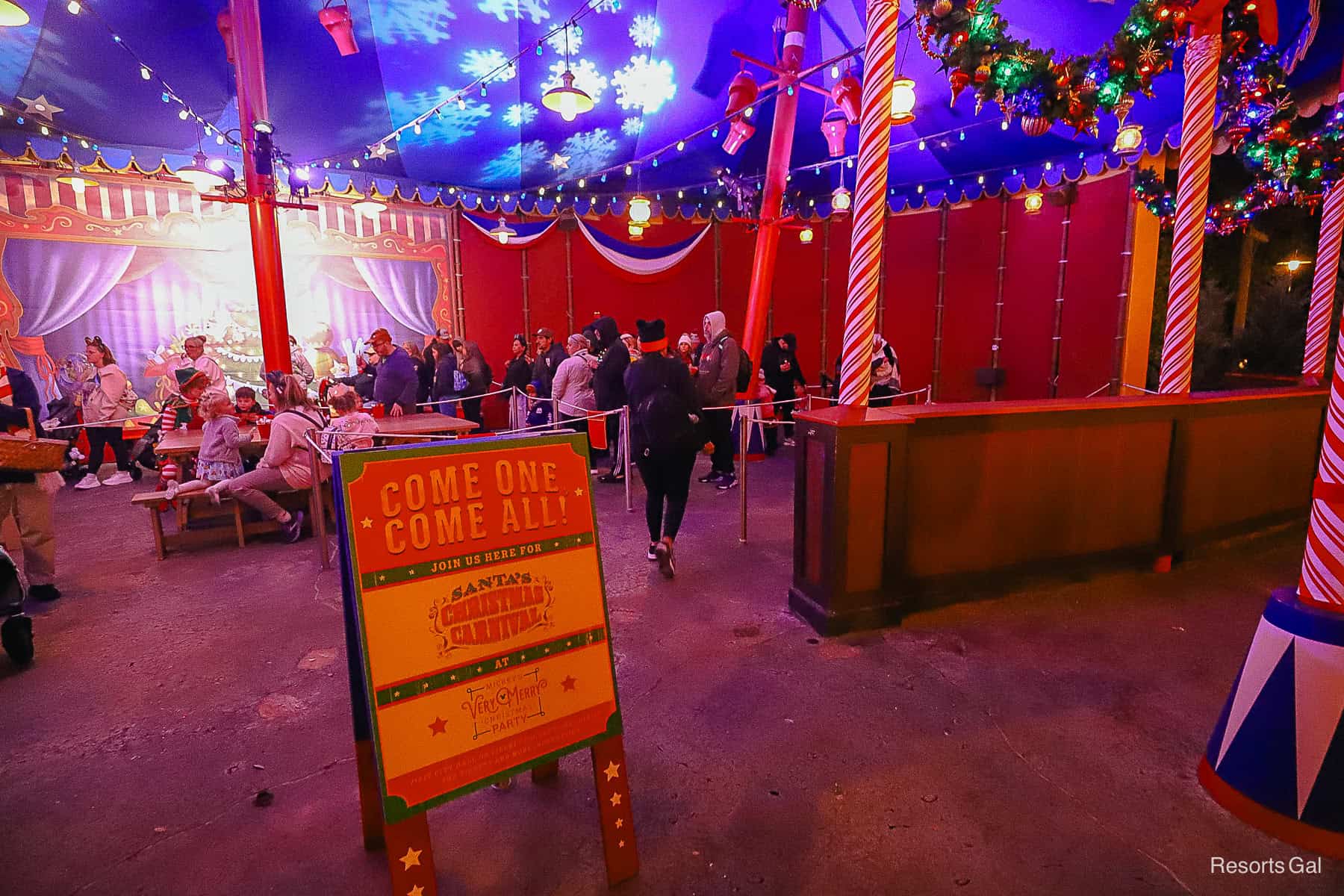 a long line of guests waiting to meet Santa