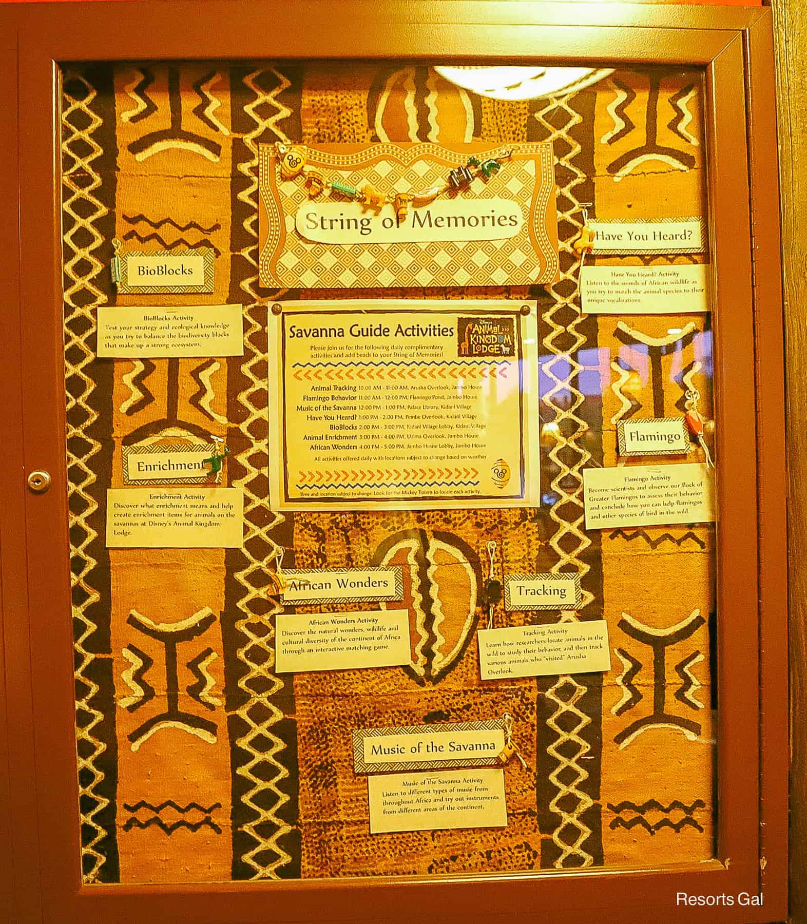 a board with the full list of String of Memories activities and examples of the beads 