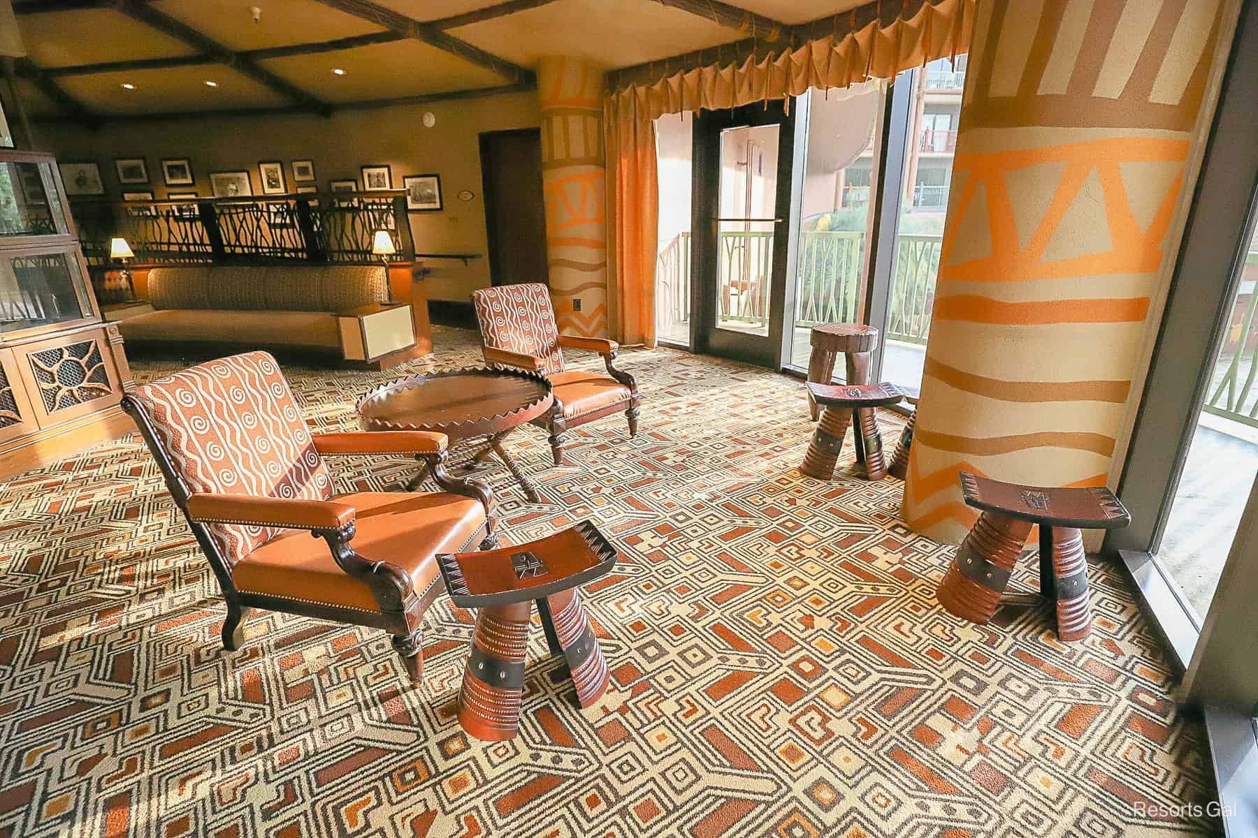 two chairs facing the window of the Sunset Overlook Lounge