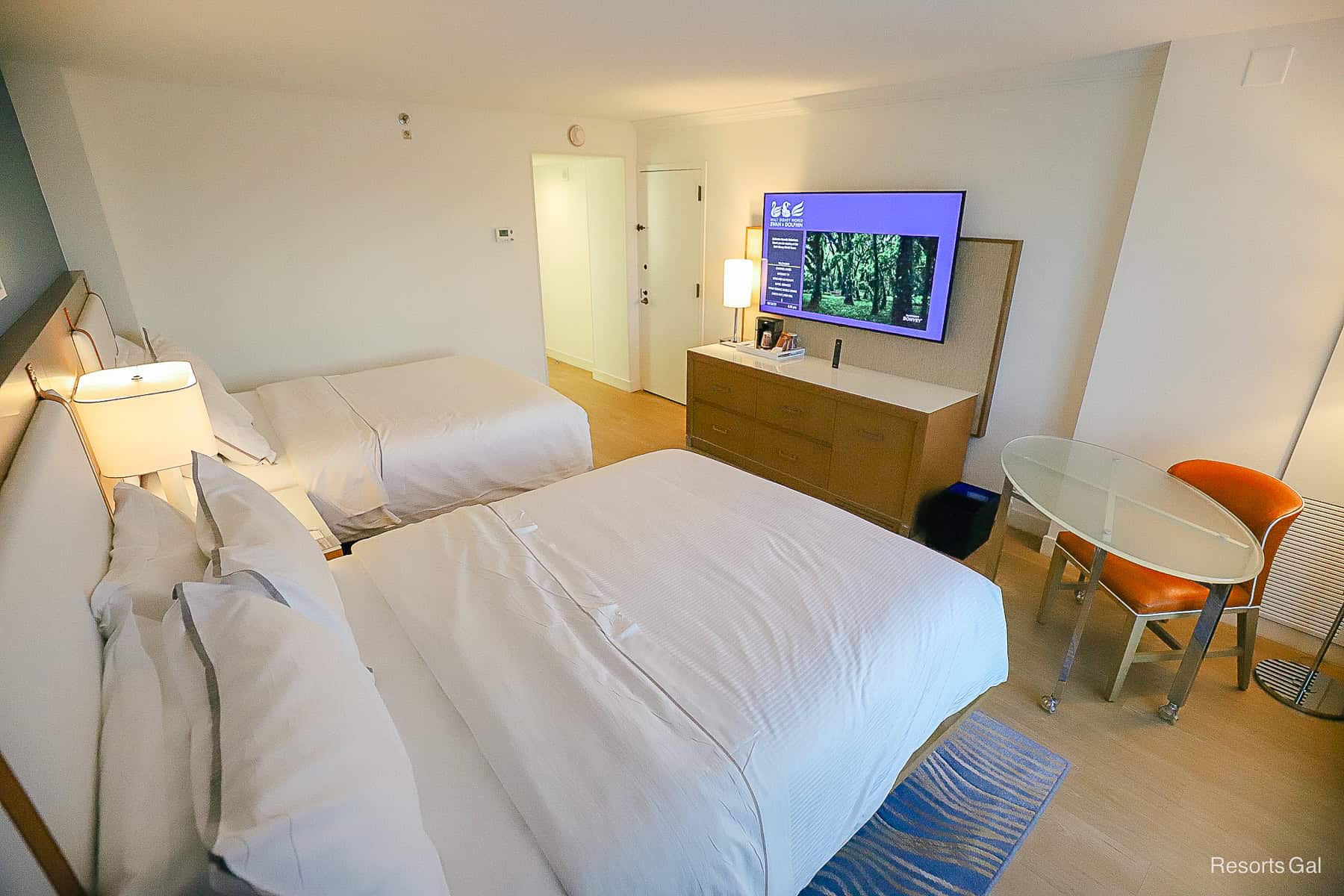 a room with two queen beds at Disney's Swan Hotel 