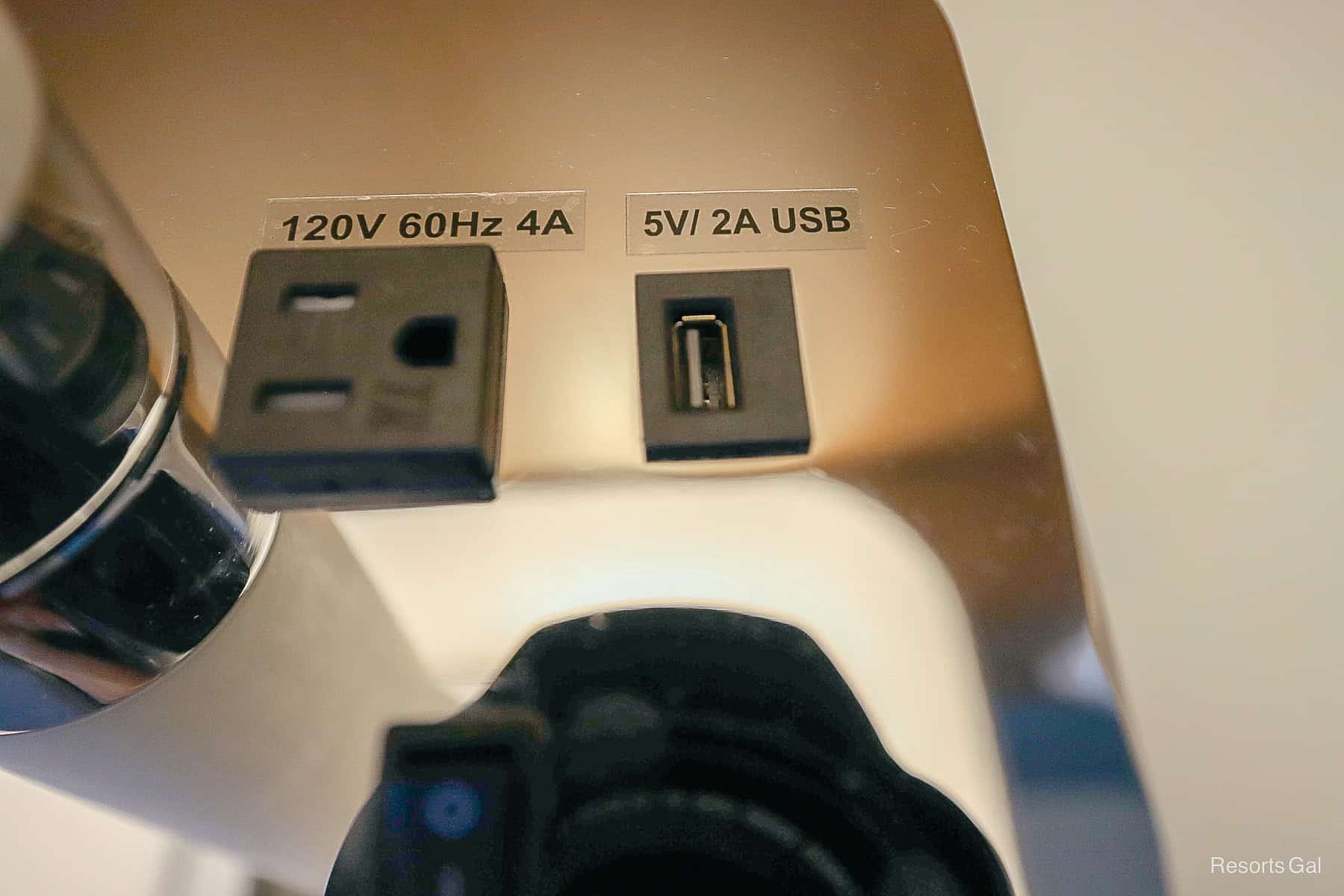 outlet types including regular 120, 60 HZ, 4A and 5V/2A USB in standard guest room at Disney's Swan 