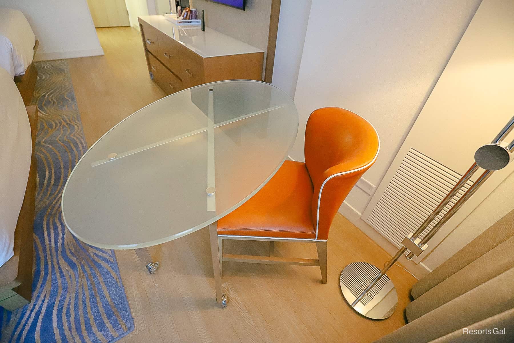 an orange leather share that works with the moveable table 