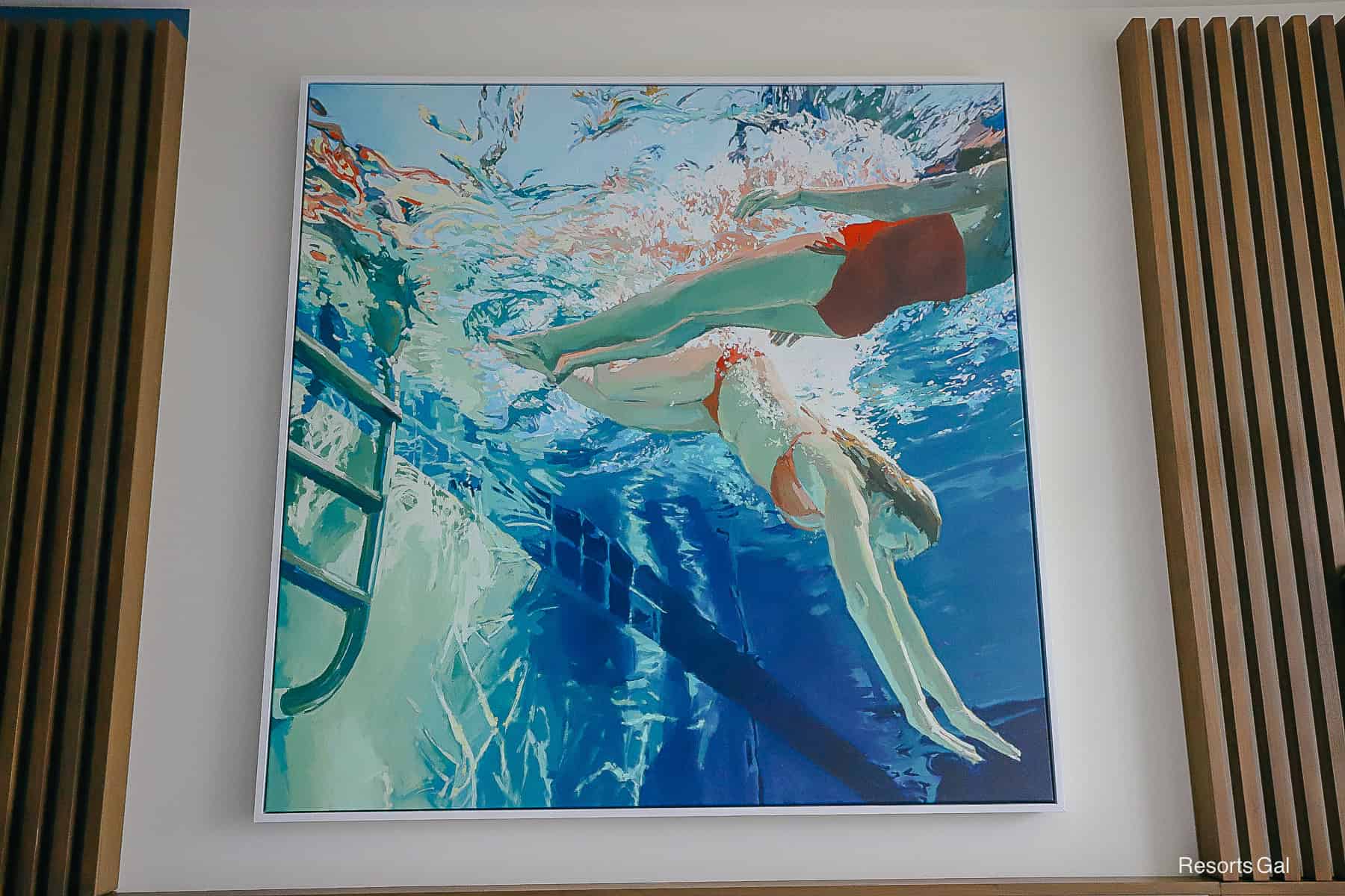 artwork featuring a pair of swimmers over the hotel bed at the Swan Reserve