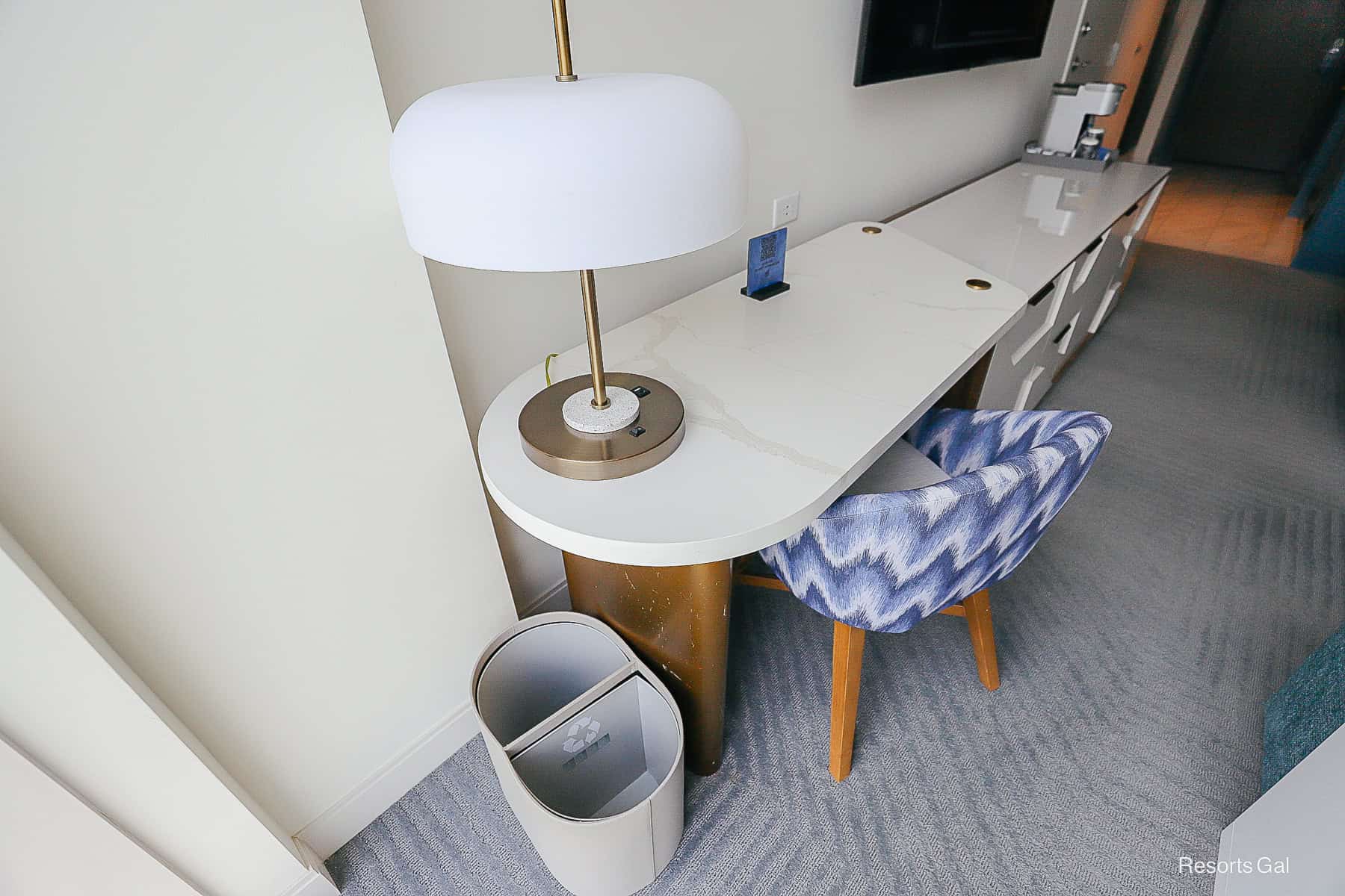 a desk with chair area in the Swan Reserve hotel room