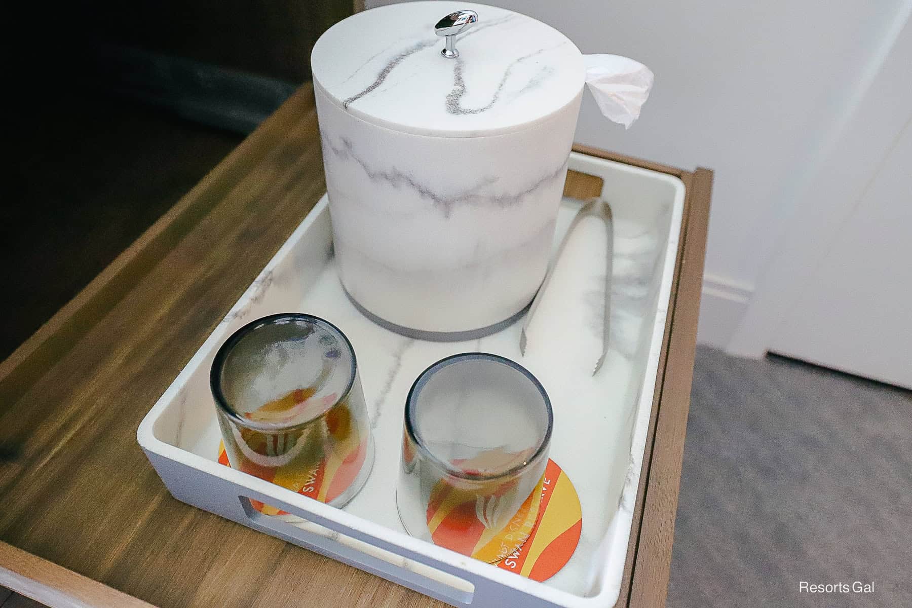 an ice bucket and glassware