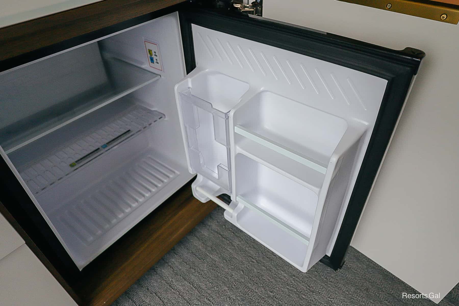 a mini fridge in our hotel room at the Swan Reserve