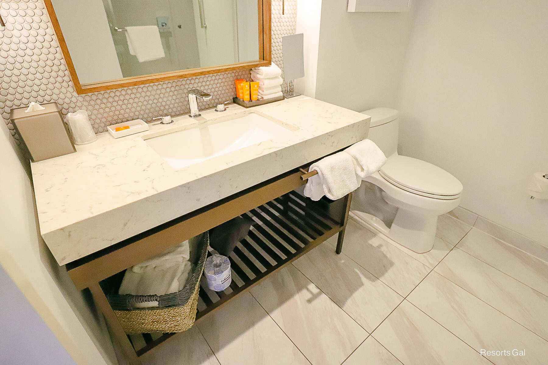 a vanity with a single sink in the Swan Reserve Hotel room bath
