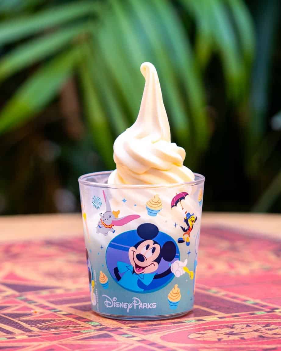 a vertical image with Mickey on the cup