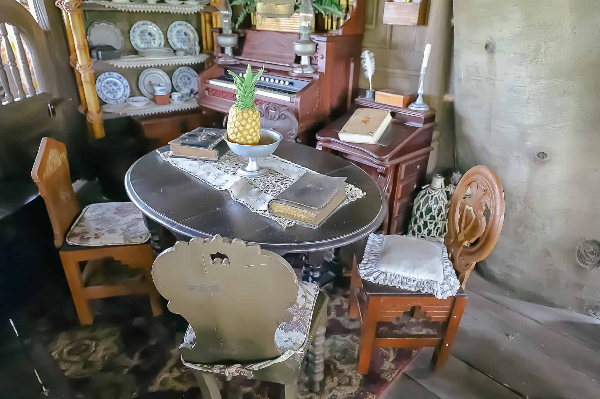 the living room with a bible on the table 