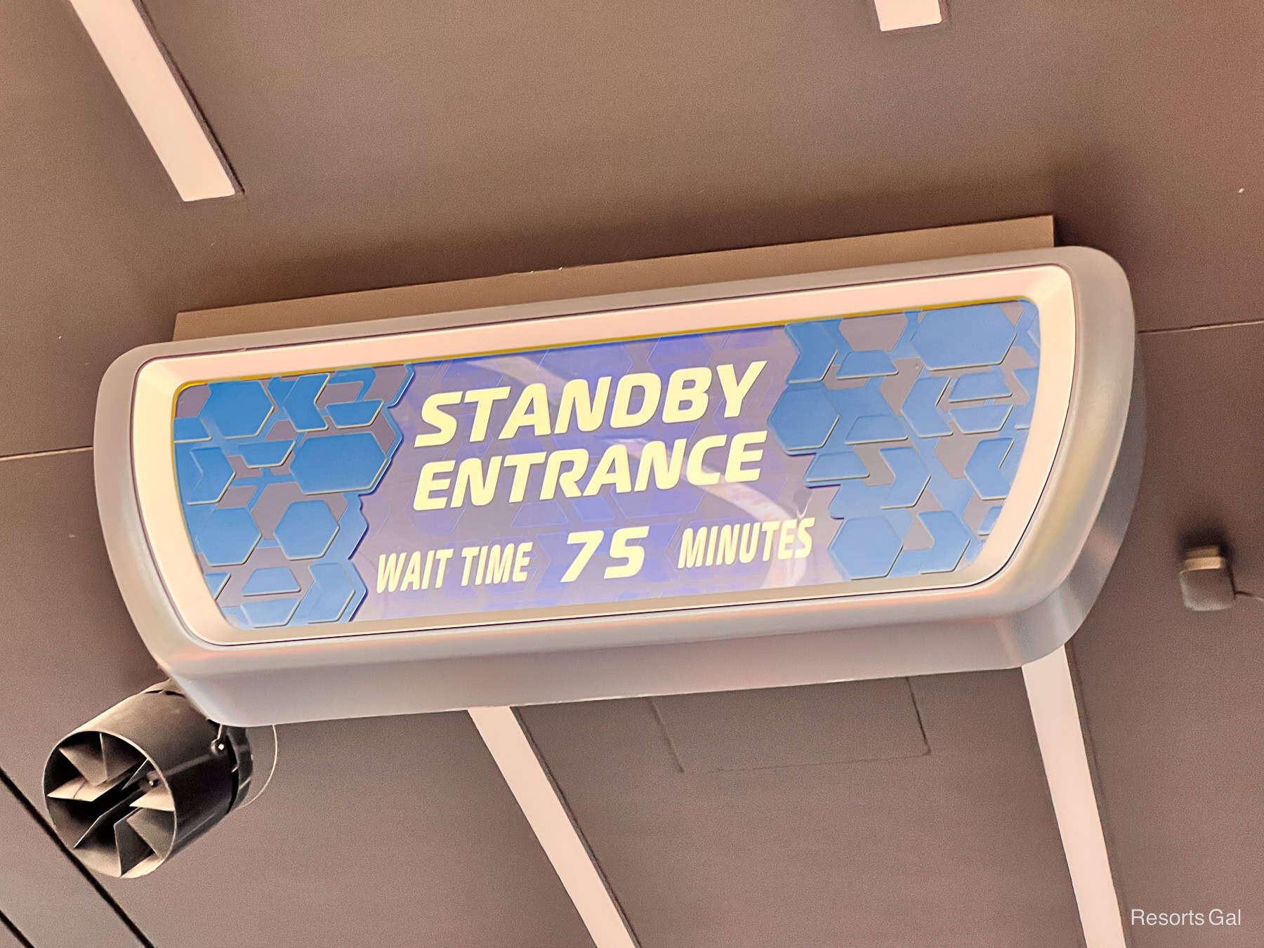 a standby entrance wait times signs that shows a 75-minute wait 