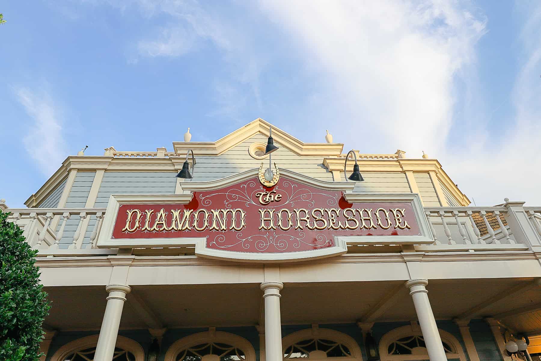 sign that says The Diamond Horseshoe