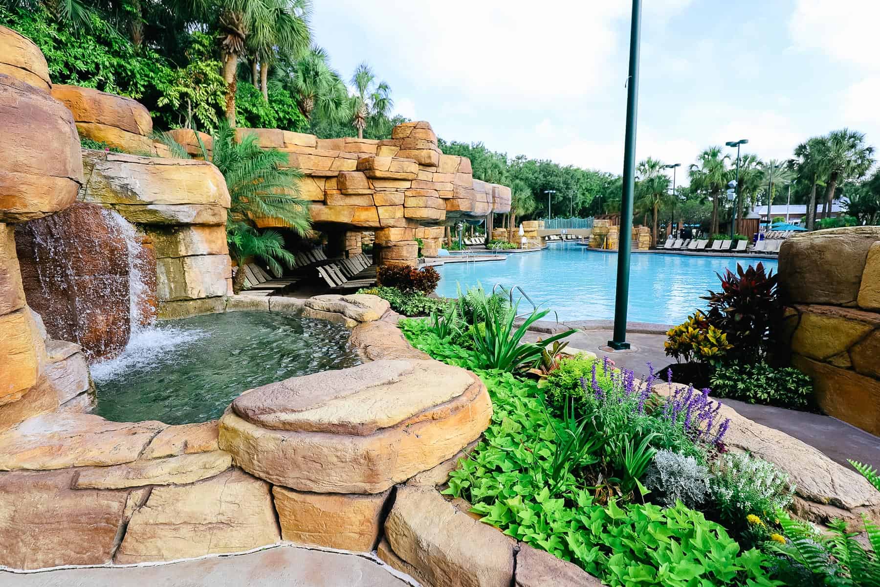 The scenic Grotto Pool at Disney's Swan and Dolphin with a waterfall feature. 