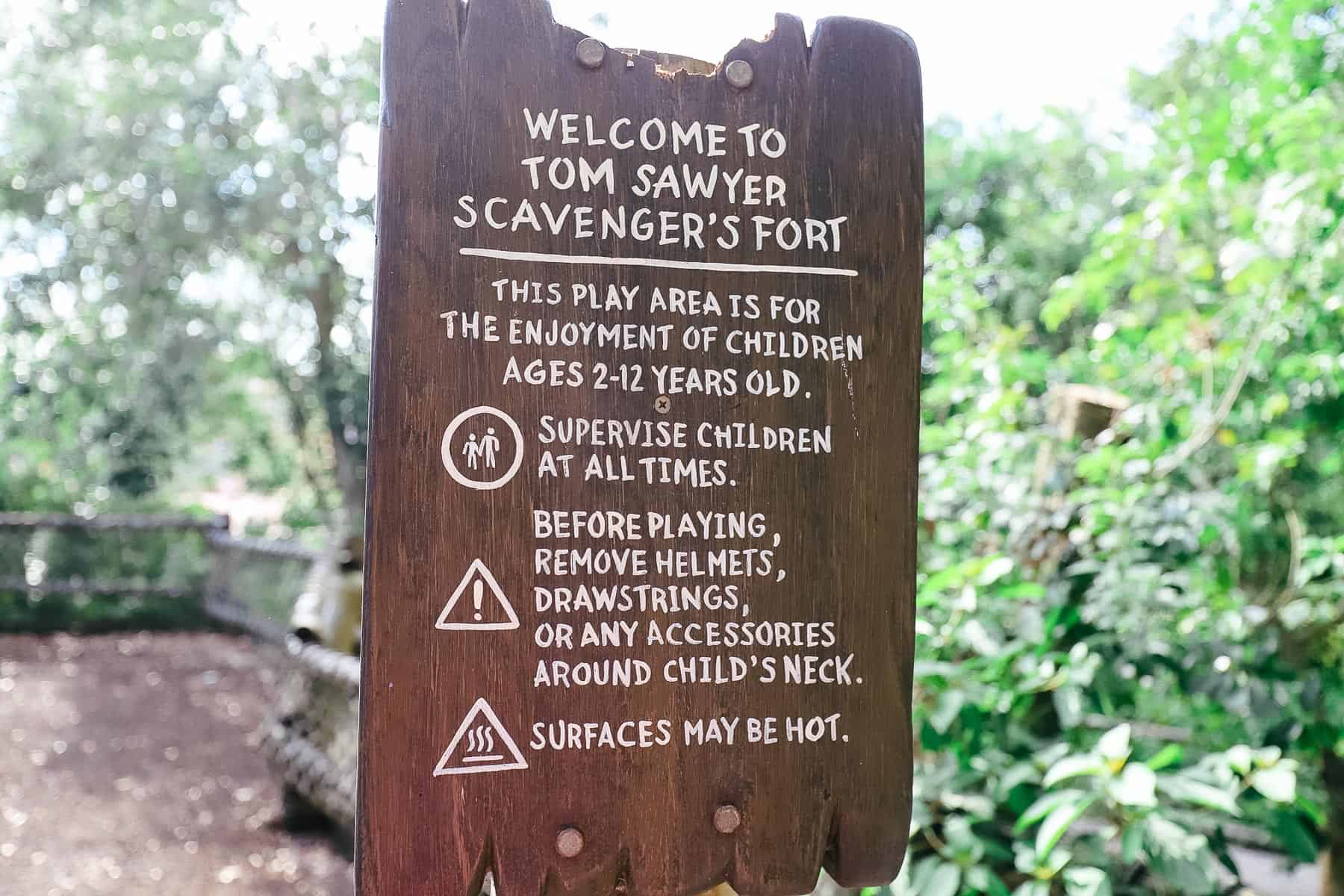 a sign welcoming guests to Tom Sawyer's Scavenger's Fort 