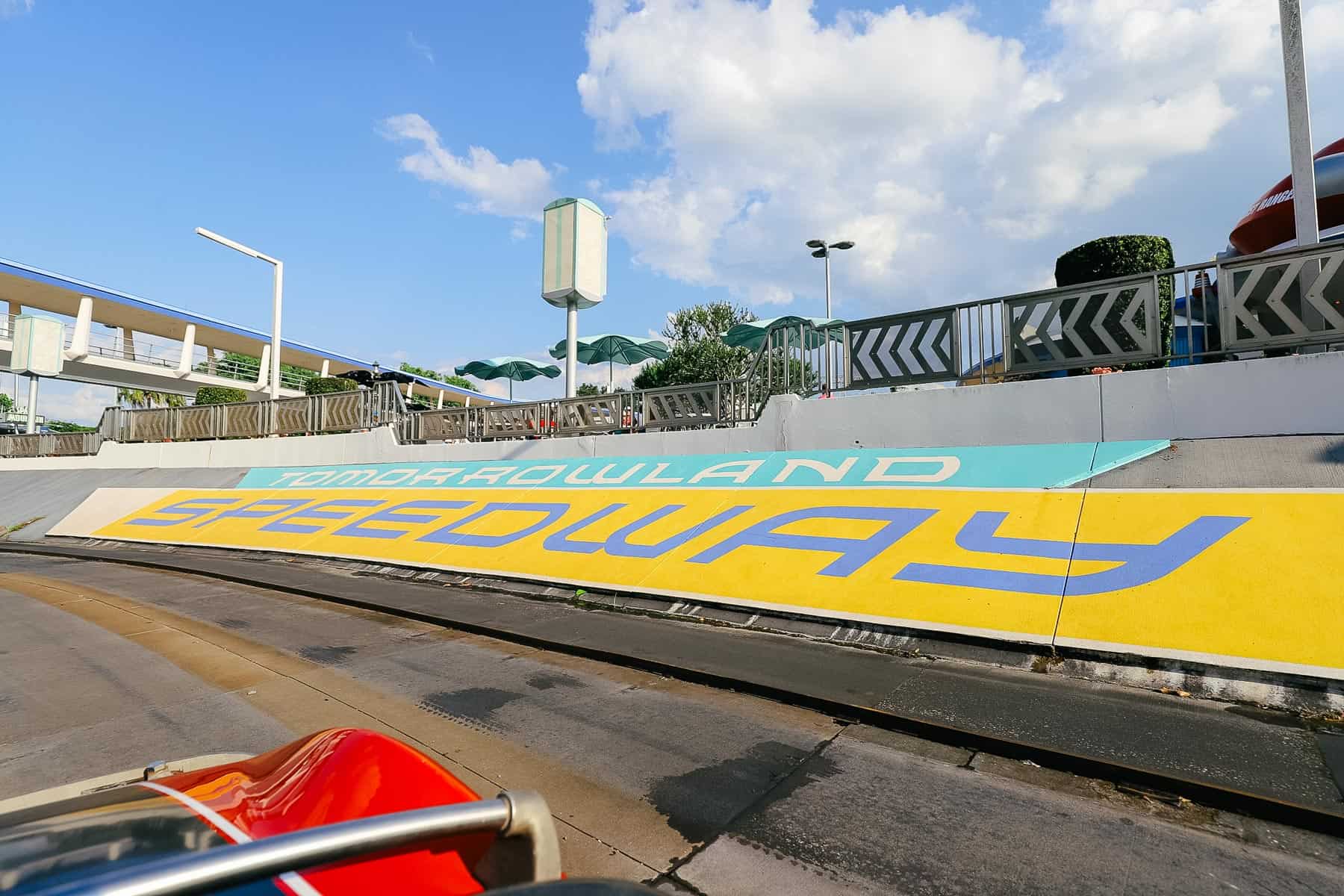Tomorrowland Speedway painted in the curve of the race track. 