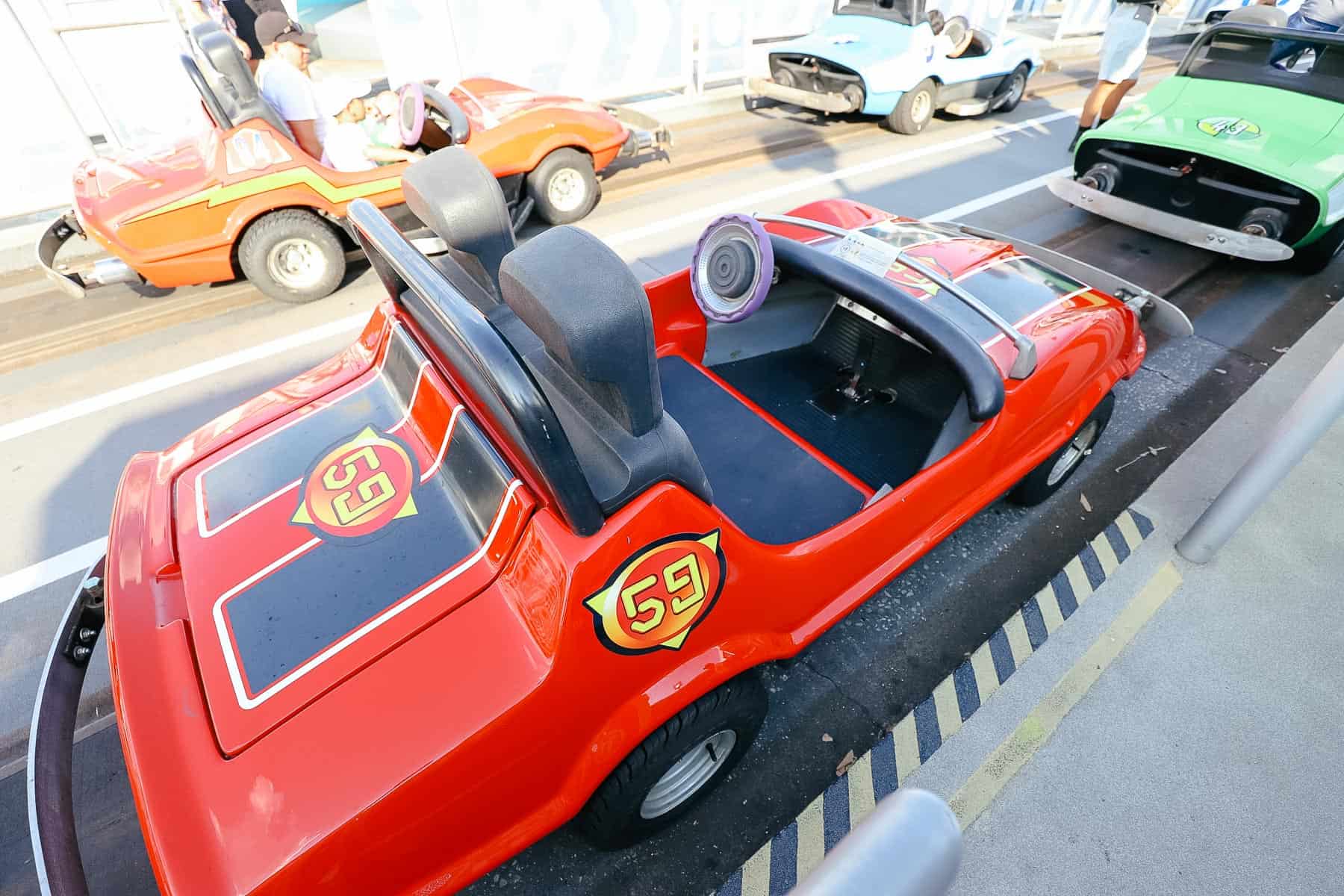 a red car ride vehicle 