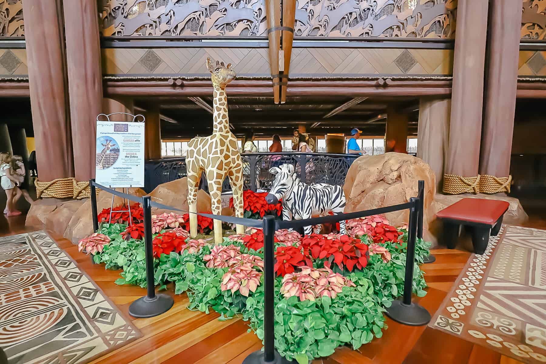 A display featuring a gingerbread giraffe and zebra. 