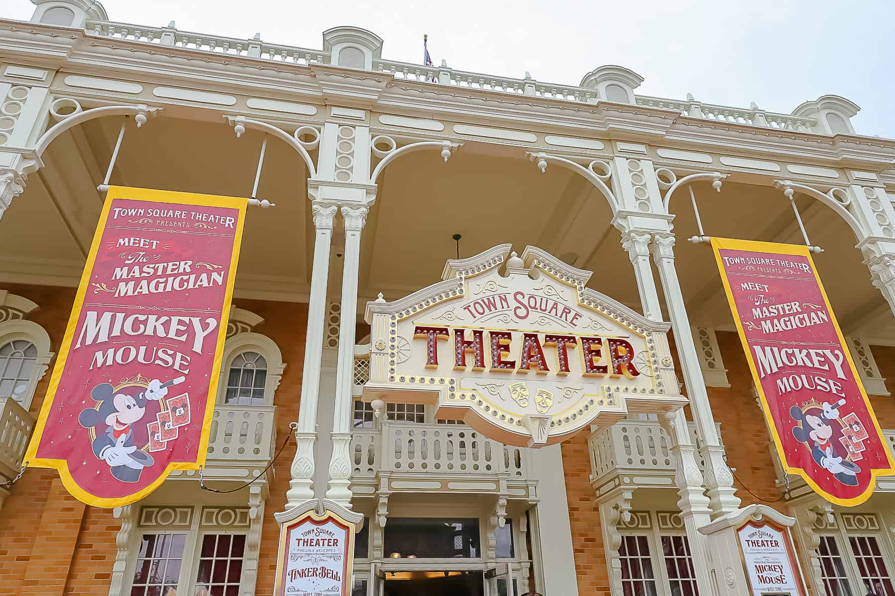 Signs advertising the Meet Mickey Mouse attraction at Magic Kingdom. 