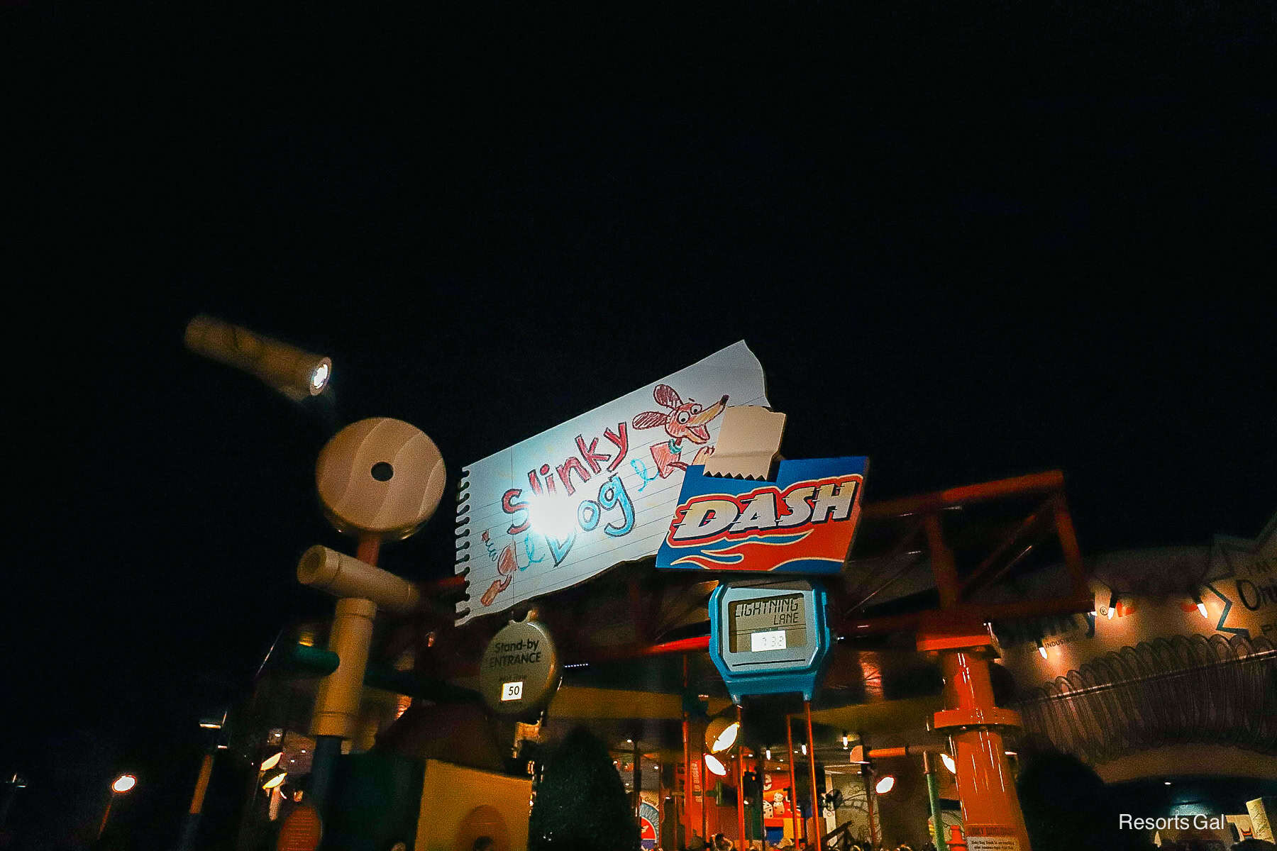 the entrance of Slinky Dog Dash at night