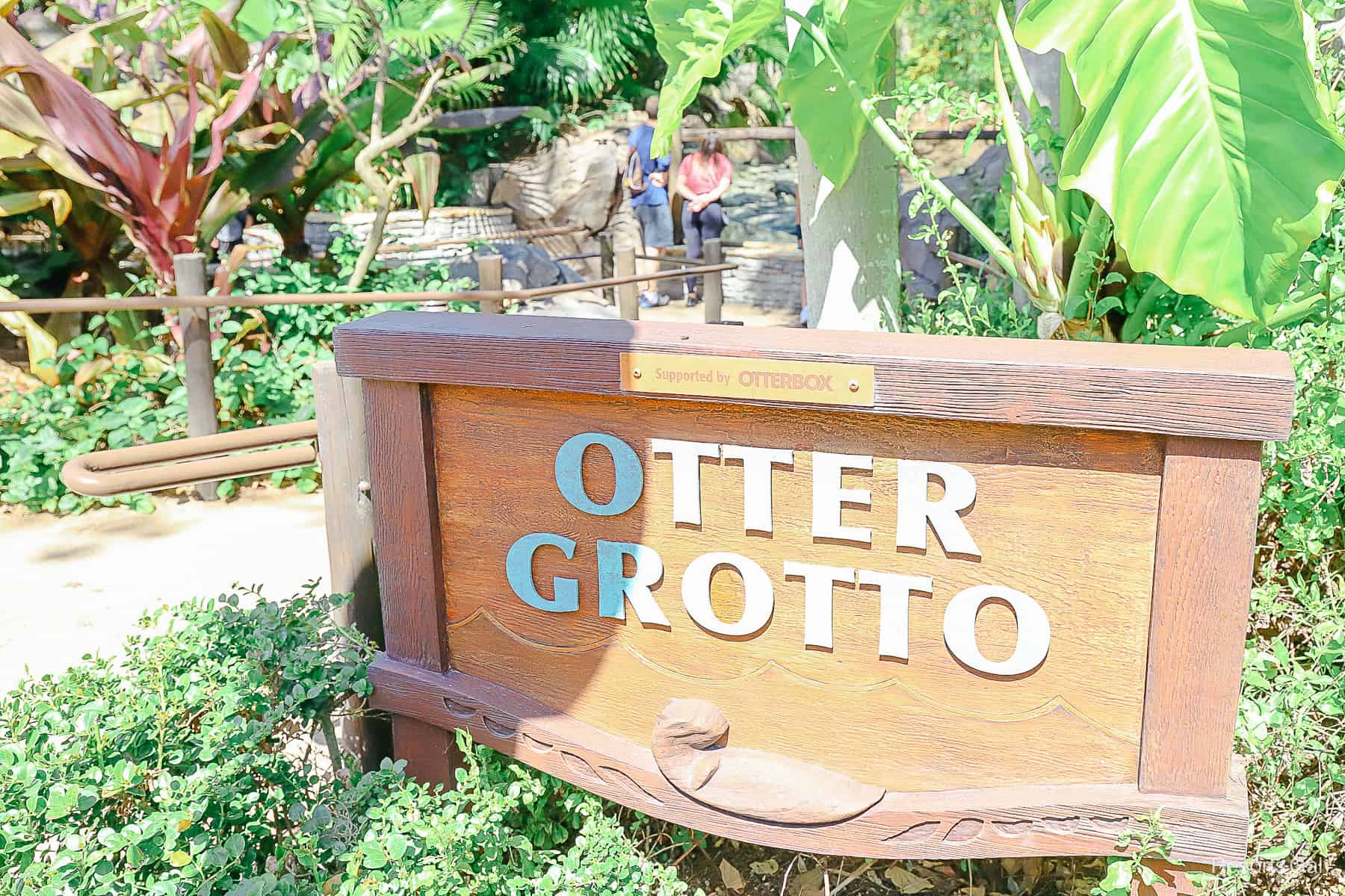 Otter Grotto signage at the base of the Tree of Life 
